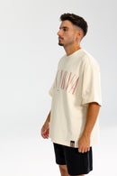 CURVE TEE CREMÉ ESSENTIALS